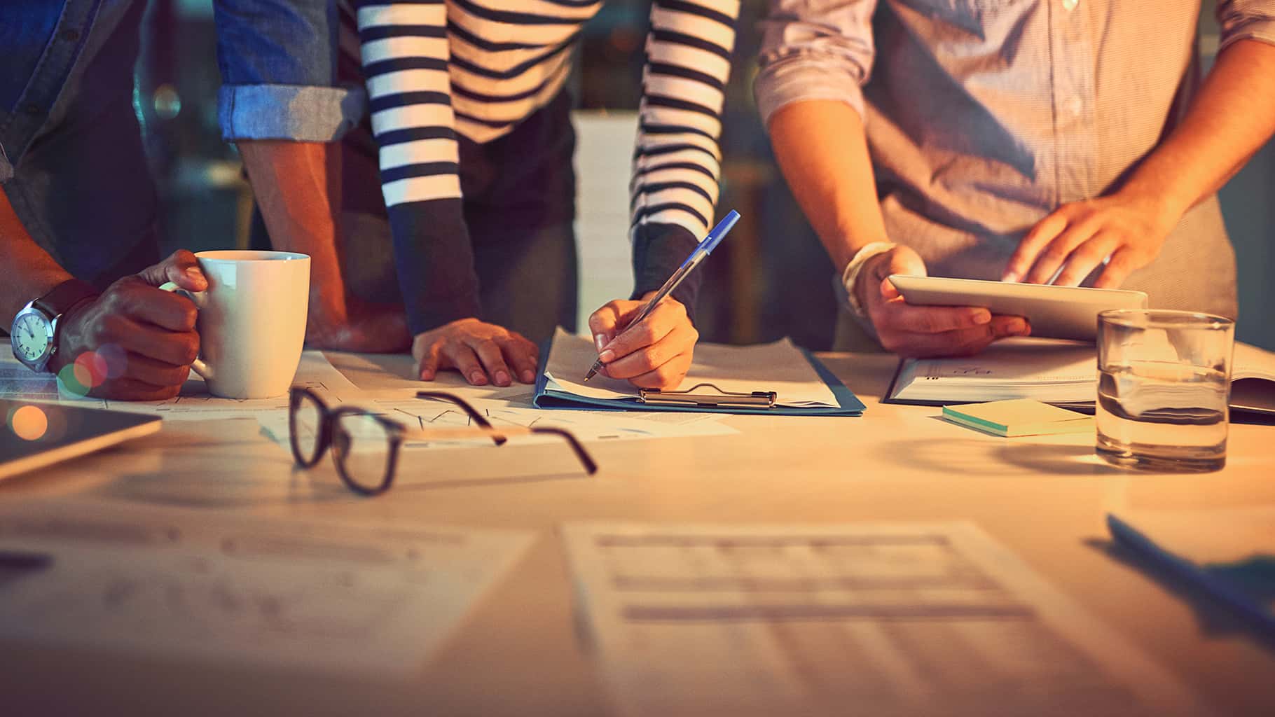 Projectal users reviewing project progress, costs and assignments